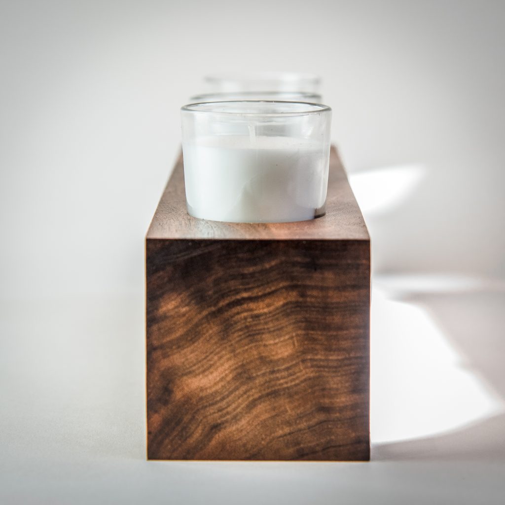 Single tealight candelabra on a figured hardwood block