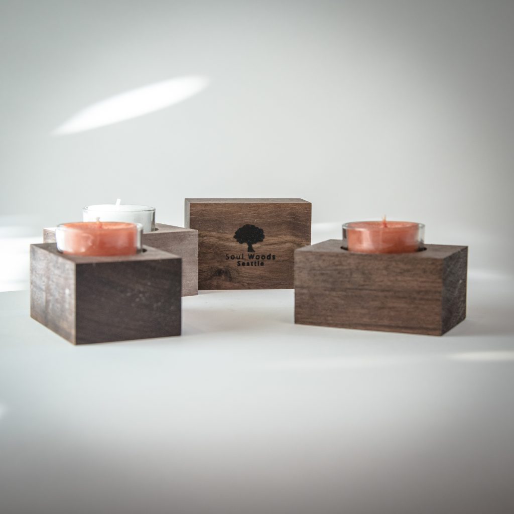 Set of three hardwood tealight candle holders