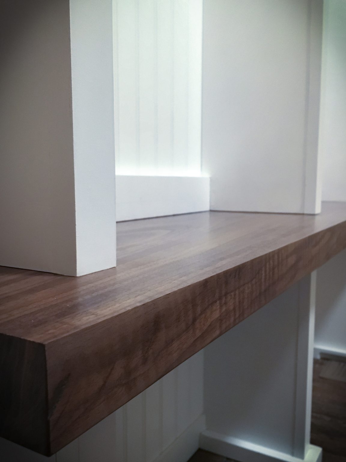 Soul Woods custom built-in with a claro walnut bench