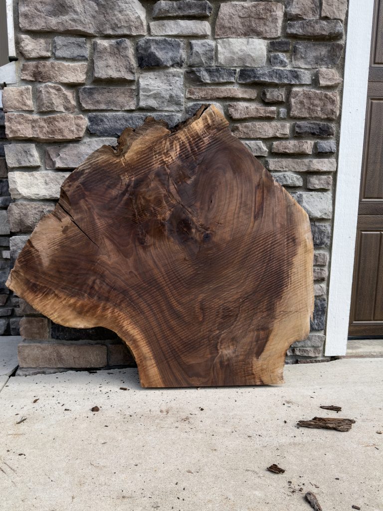Wide, irregular black walnut live-edge slab