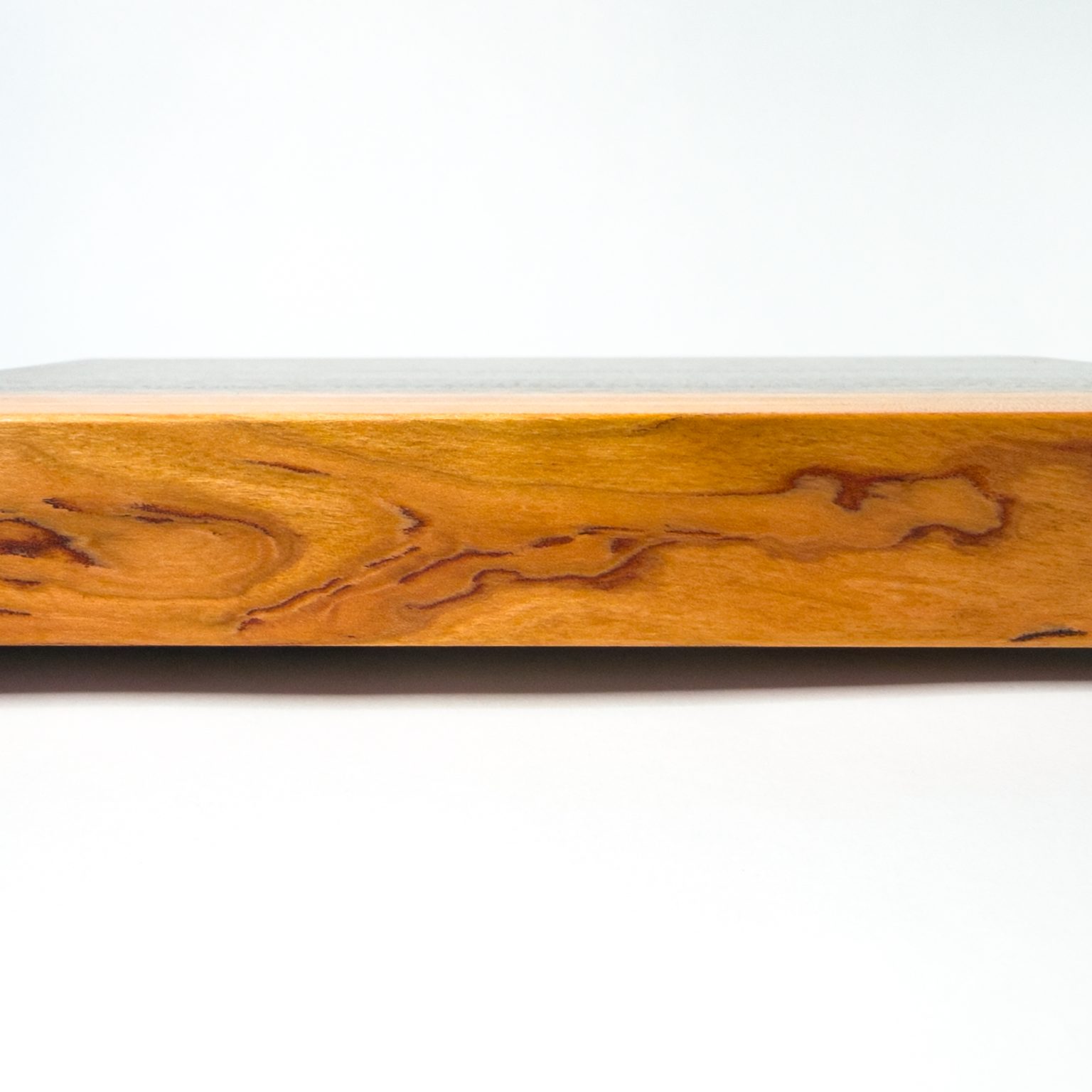 Gummy cherry face of the Xenia board, side view