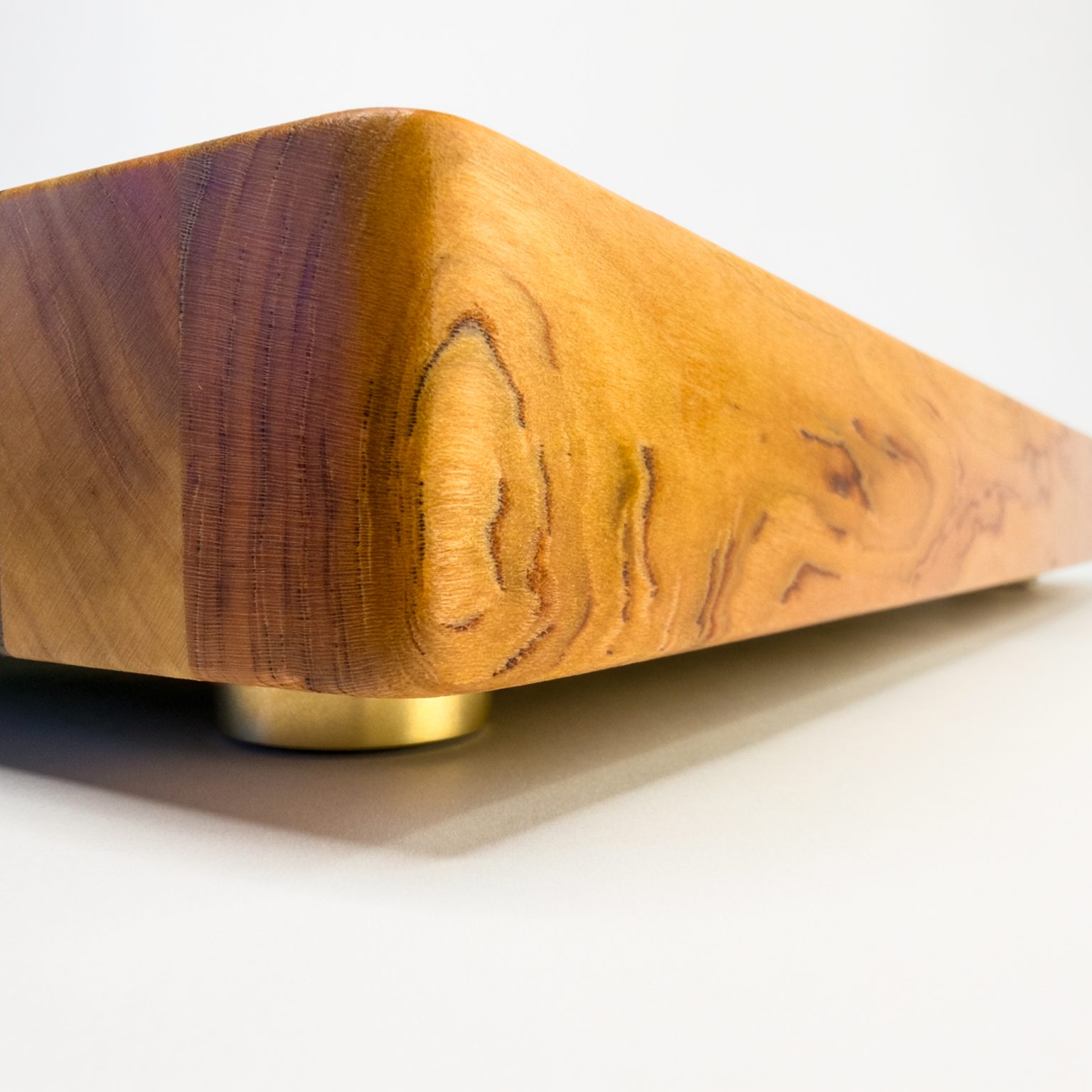 Corner of the Xenia board showing the brass foot