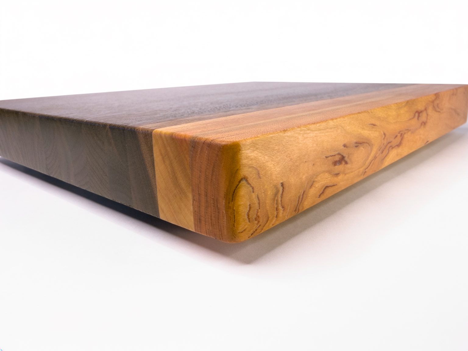 Xenia board from a low angle, walnut and gummy cherry