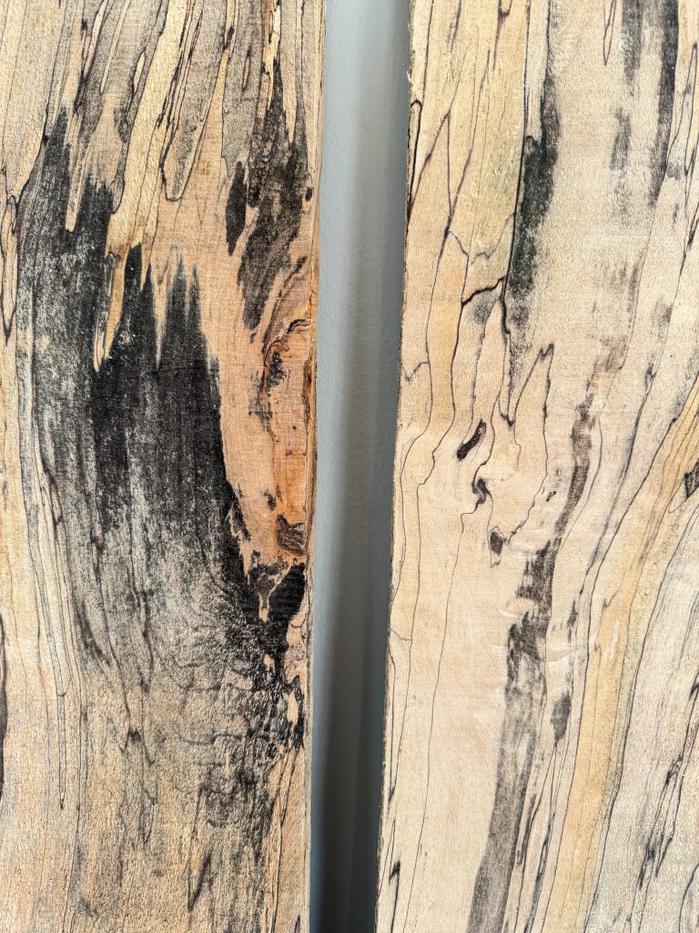 Close-up of heavy spalting and black zone lines on both boards