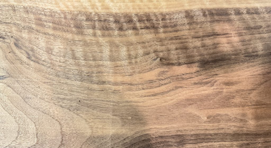 Curly walnut board with rippling, shimmering figure