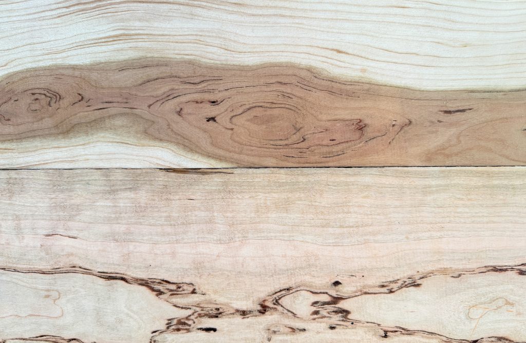 Gummy cherry boards with dark gum flecks and swirling streaks