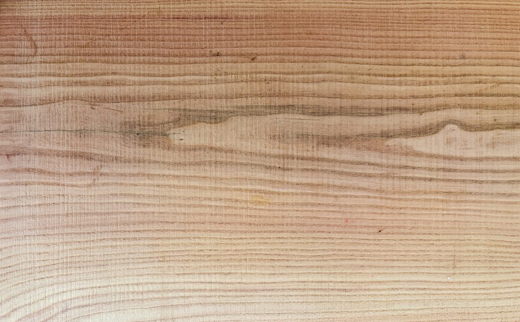 Red elm board with warm, interlocked grain