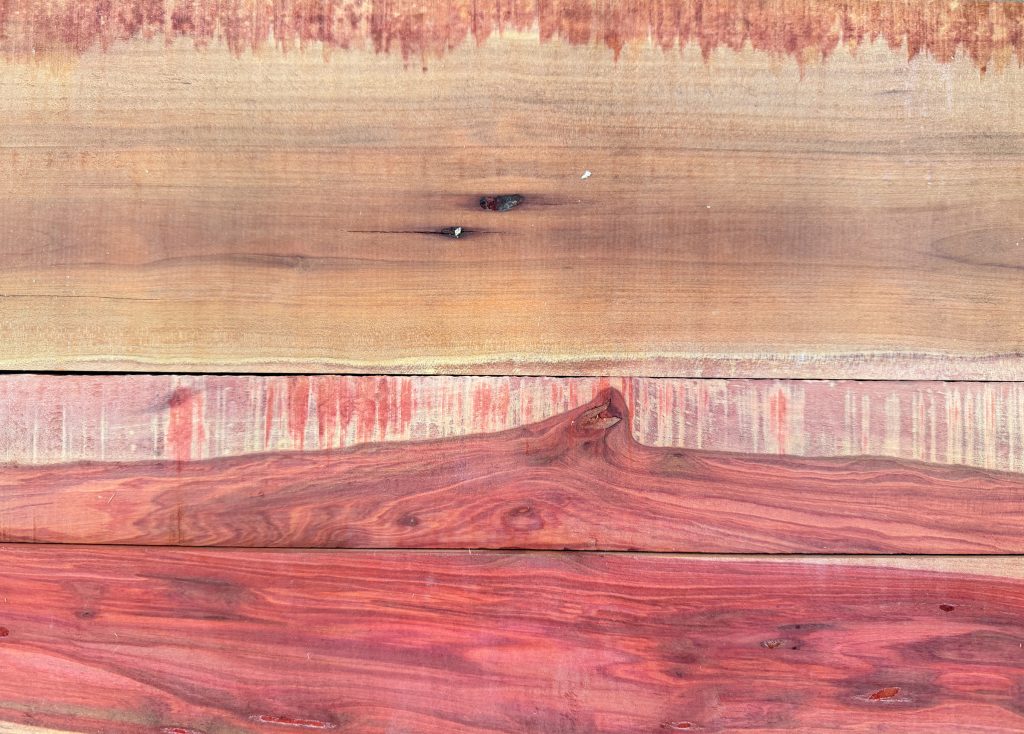 Redheart boards with bright red heartwood and pale sapwood