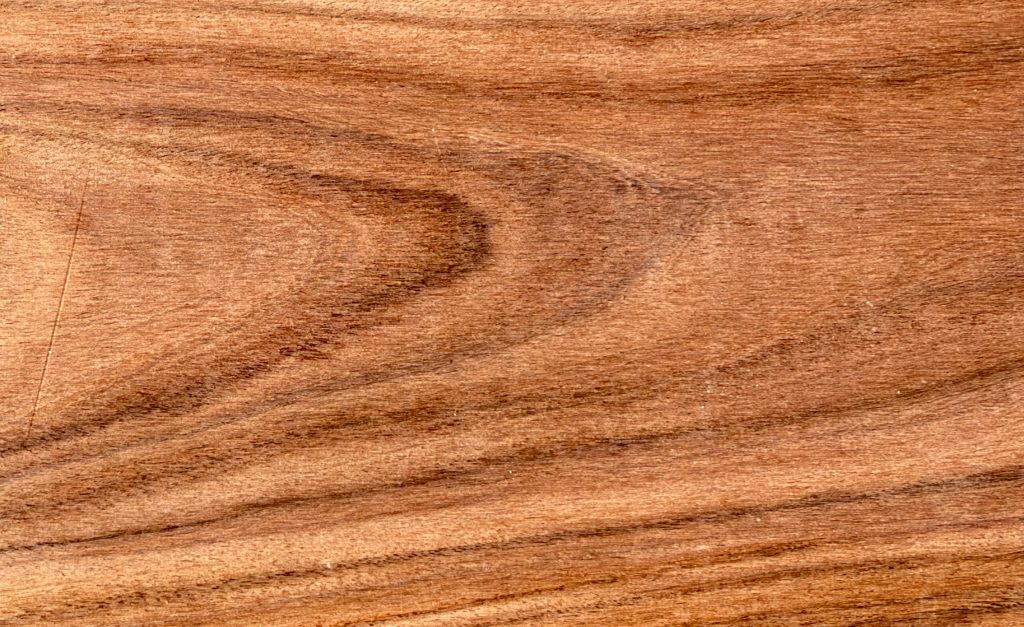 Caribbean rosewood board with fiery orange and red-brown stripes